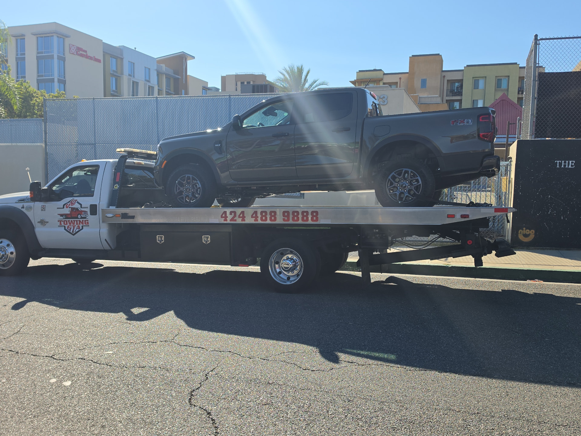 Pickup truck loaded on the Towing GTA flatbed